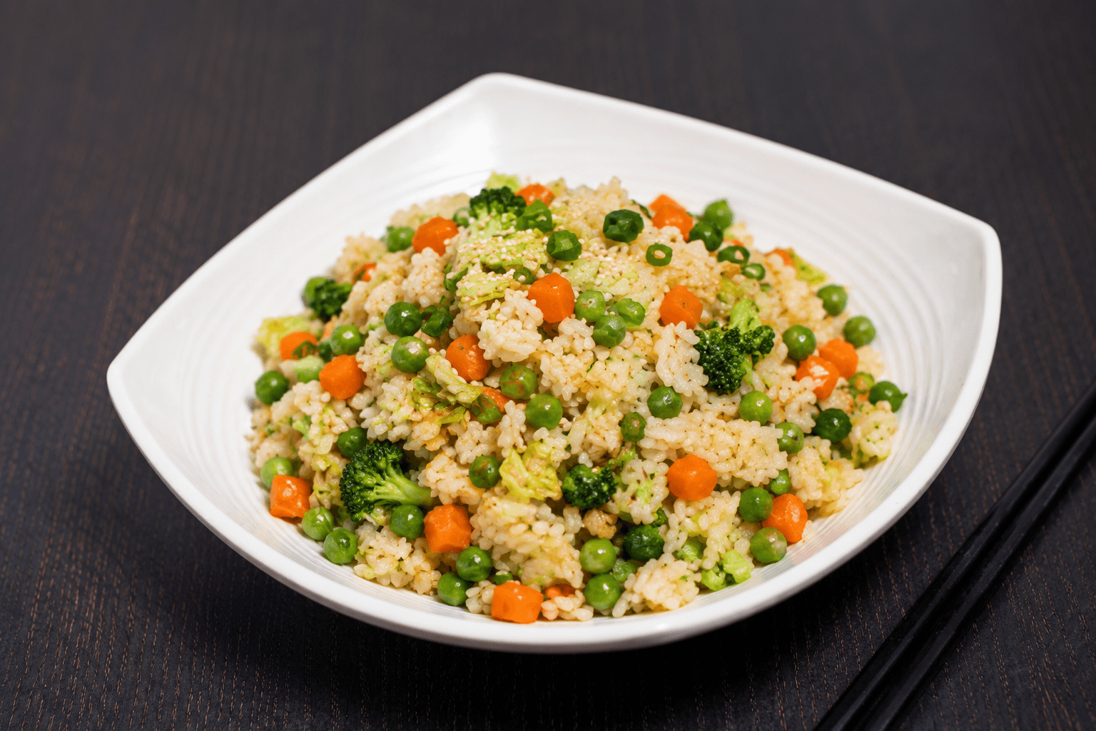 Vegan Fried Rice (No Egg) - A flavorful stir-fried rice dish made with a variety of vegetables such as brocc | Rice